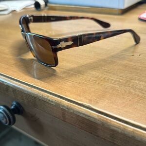 Men’s Persol sunglasses.